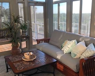 Main Level/Sunroom
Daybed with New full zip cover. 
Glass Tile top & Iron table