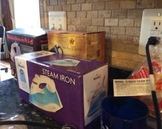 New in box Rival steam iron, kitchen aid mixer.