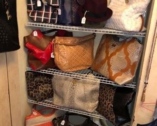 A closet full of BRAHMIN leather purses!