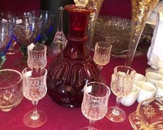 Cranberry glass decanter and cordials
