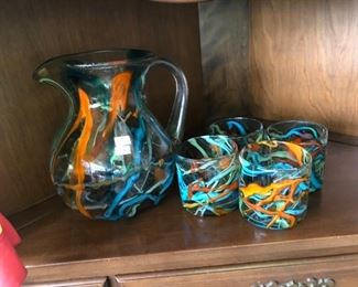 Unique glass pitcher and tumblers