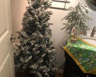 Even the bathroom is filled with Christmas trees!