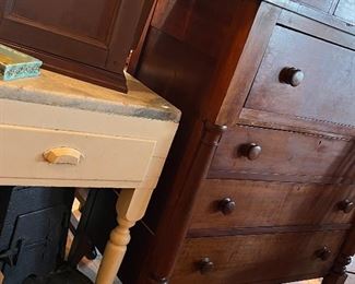 A rare example of a Southern heart pine biscuit table. 