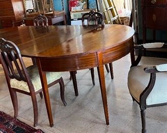 Early 19th Century Table with Central Drop Leaf Section and two Demilune ends. Tapered legs with line inlay. Possibly Piedmont South Carolina.