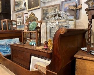 Twin Sleigh Bed, Many antique trunks and chests 