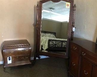 Antique carved cheval  mirror with brass stud decoration.  Purchased  from estate of  Pulitzer Prize winning playwright, Eugene O'Neill, Casa Genoa, Sea Iskand, Georgia