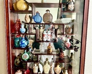 Antique Chinese snuff bottles...over 50 I believe.