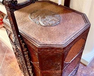 large heavily carved wedding basket.  Perfect as a side table.