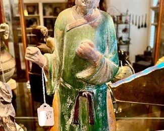 Another antique tomb figurine.