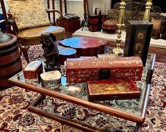 Love the glass top Asian inspired coffee table.  Modern.