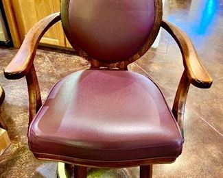 4 lovely leather armed swivel bar stools.