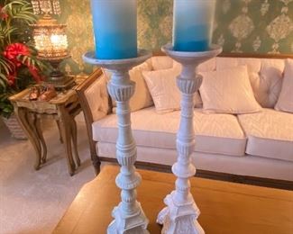 Pair of white pillar candle holders