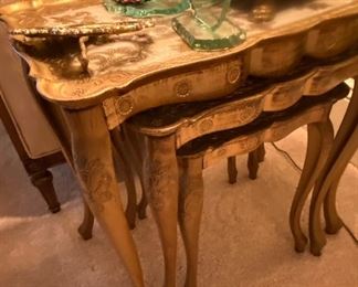 Two sets of Florentine gilded nesting (3)tables
