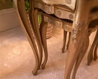 Two sets of Florentine gilded nesting (3)tables