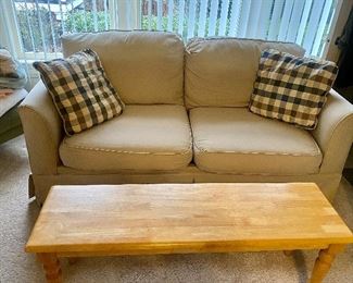 Khaki color trundle loveseat and coffee table