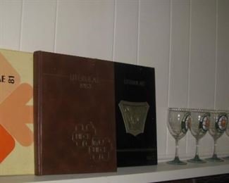 Yearbooks and hand painted Mercyhurst glasses