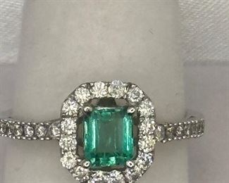 Over 1 ct Emerald cut Emerald Ring with VS diamonds in solid gold ring