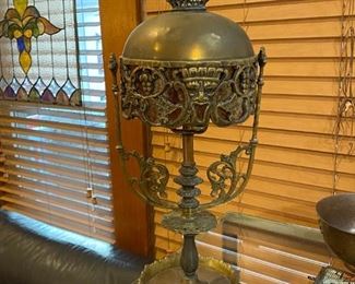 Wonderful antique brass lamp with face