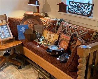 Fun Southwest style divan and pillows displaying an selection of goodies