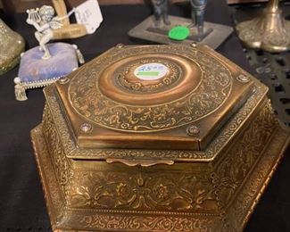 Neat antique jewelry/trinket box with jeweled corners.