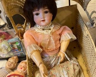 Antique German bisque doll with jointed composition body.