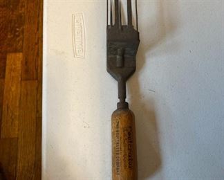 We had to search to determine what this is ...a vintage ice scraper!