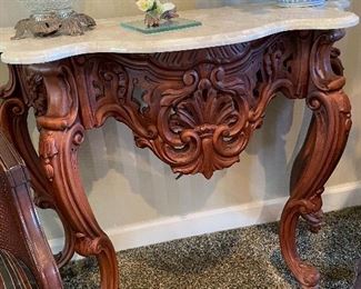 Ornate marble top console table