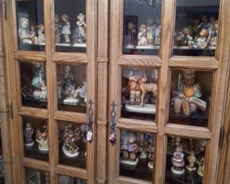 Cabinet of Hummel figurines