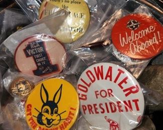 Vintage advertisement and political pins