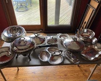 Many pieces of silver plate serving pieces in great condition