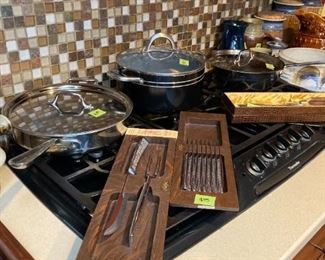 All clad pans. Carving sets, steak knives