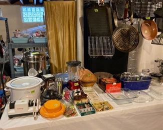 Crock pot, knife sharpener, blender, kitchen scale, pyrex and lots more