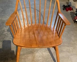 One of two Windsor-type oak armchairs 