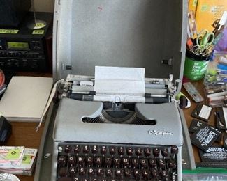 Antique "Olympia" typewriter in mint condition, with case.
