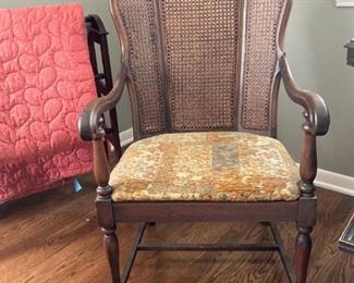 Antique chair with caned back