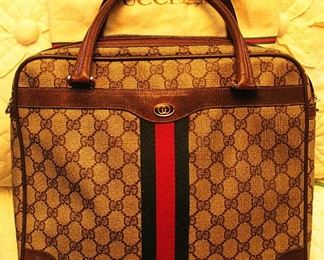 Genuine Gucci Canvas Leather Tote Handbag - The zipper is Broke but who cares it's a Gucci! The zipper is not noticeable.