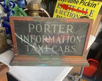 Early metal framed Porter Taxi sign. We believe either mounted in hotel lobby or in Taxi Cab office. (Glass cracked)