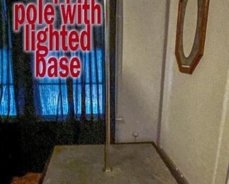 Stripper pole with lighted base 