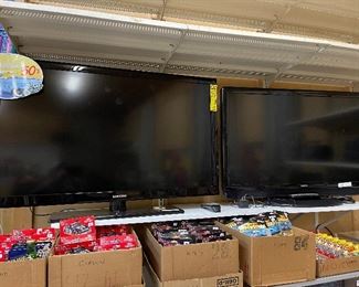 Two Big Screen TVs