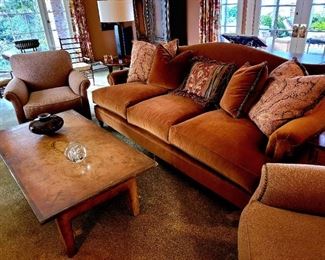 Pair of cream club chairs, and terra cota suede sofa