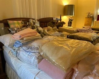 MCM king size bed with linens