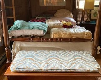 Double bed, cedar chest with linens and clothes