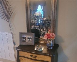 Another small cabinet with a drawer and two doors, mirror sold separately
