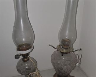 Kerosene lamps bases in tact with added electrical non evasive wiring.
