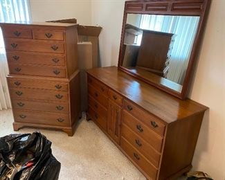 Vintage Davis Cabinet Company Bedroom Set
We have priced these as a set
OR
Individually 

-Chest on Chest Dresser 
(34” across x 21” deep x 5’ tall)

-Long Dresser with Mirror 
(65” long x 22” deep x 34” tall to top of dresser, add 38” for mirror)

-Nightstand Set with glass top 
(21 1/2” across x 17” deep x 28” tall)

Chest & nightstand have minor imperfections
Long dresser has spots on top.
Must be able to move and load yourself.