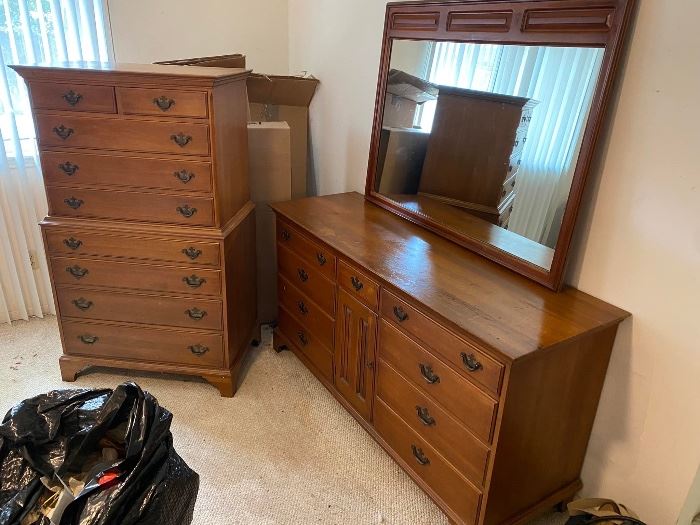 Vintage Davis Cabinet Company Bedroom Set
We have priced these as a set
OR
Individually 

-Chest on Chest Dresser 
(34” across x 21” deep x 5’ tall)

-Long Dresser with Mirror 
(65” long x 22” deep x 34” tall to top of dresser, add 38” for mirror)

-Nightstand Set with glass top 
(21 1/2” across x 17” deep x 28” tall)

Chest & nightstand have minor imperfections
Long dresser has spots on top.
Must be able to move and load yourself.