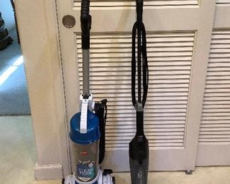MLC102 Two Bissell Vacuums