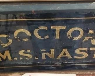 antique reverse painted dr Nast sign 