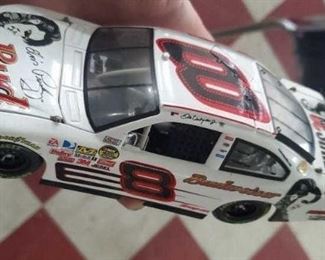 Nascar stock car die cast collectibles.  some are signed