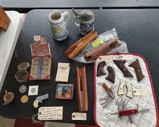 antique razor blade store display, old pistol grips and rifle grips, derringer toy cap gun, south asian vietnam survival cards cowboy tin, 2 jack knives, more